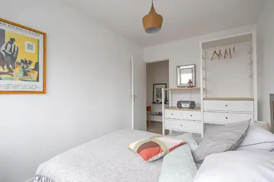 Un ou plusieurs lits dans un hébergement de l'établissement Appt agréable avec balcon au sud-ouest de Caen
