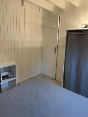 Un ou plusieurs lits dans un hébergement de l'établissement Chalet rénové Cabourg