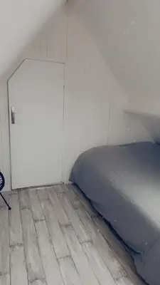 Un ou plusieurs lits dans un hébergement de l'établissement Chalet rénové Cabourg