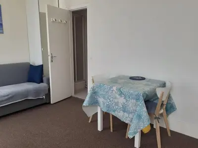 Un ou plusieurs lits dans un hébergement de l'établissement Cabourg Charmant studio centre ville RUE DE LA MER