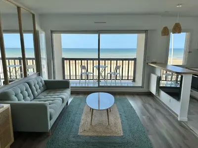Coin salon dans l'établissement Vue mer exceptionnelle à Cabourg