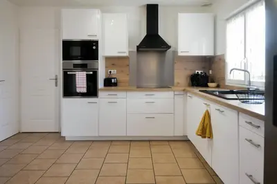 Cuisine ou kitchenette dans l'établissement Détente cosy
