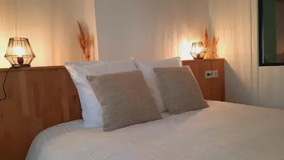 Un ou plusieurs lits dans un hébergement de l'établissement Gîte Pontors'home Mont Saint-Michel