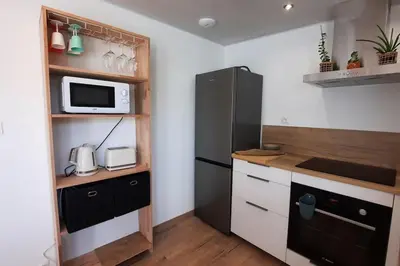 Cuisine ou kitchenette dans l'établissement Gîte Pontors'home Mont Saint-Michel