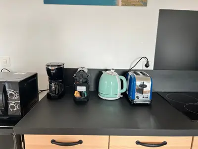 Cuisine ou kitchenette dans l'établissement Maison rénovée à Agon-coutainville proche de la mer, classé meublé de tourisme 3 étoiles
