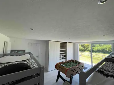 Un ou plusieurs lits dans un hébergement de l'établissement Gîte 200m2 avec spa