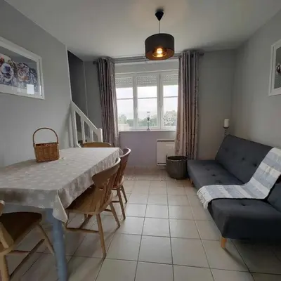 Coin salon dans l'établissement Perfect Gites In Normandy