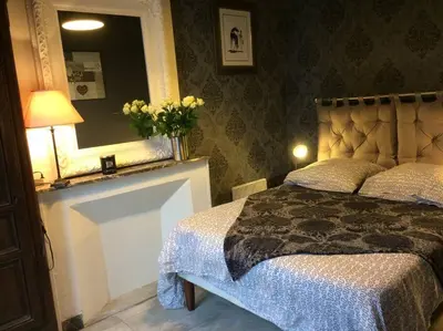 Un ou plusieurs lits dans un hébergement de l'établissement Domaine de Valmeray Gîte