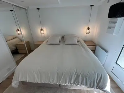 Un ou plusieurs lits dans un hébergement de l'établissement Studio Cosy centre historique