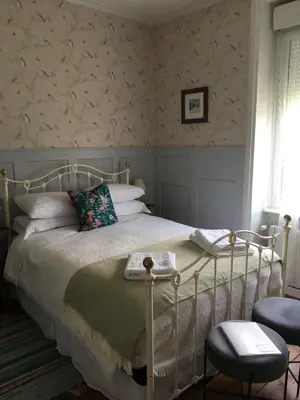 Un ou plusieurs lits dans un hébergement de l'établissement Le Presbytère Chambre D'Hôtes