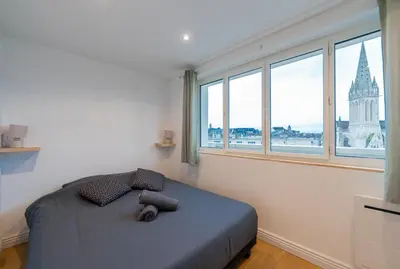 Un ou plusieurs lits dans un hébergement de l'établissement Appt premium Centre Château terrasse 2 chambres 6p vue exceptionnelle