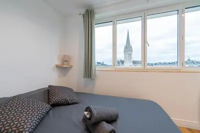 Un ou plusieurs lits dans un hébergement de l'établissement Appt premium Centre Château terrasse 2 chambres 6p vue exceptionnelle