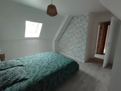 Un ou plusieurs lits dans un hébergement de l'établissement Jolie maison au calme et proche mer avec spa en option