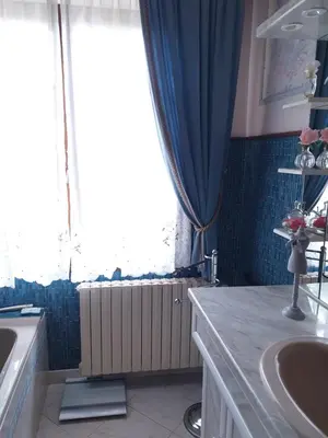 Coin salon dans l'établissement Maison dans le bourg