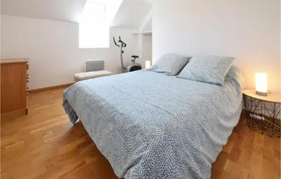 Un ou plusieurs lits dans un hébergement de l'établissement La Maison Du Dy