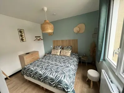 Un ou plusieurs lits dans un hébergement de l'établissement Coin de paradis avec spa illimité en plein centre Avranches