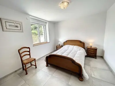 Un ou plusieurs lits dans un hébergement de l'établissement Charmante maison neuve proche plage, 4 chambres, 7 couchages, jardin, parking et tout confort - FR-1-361-511