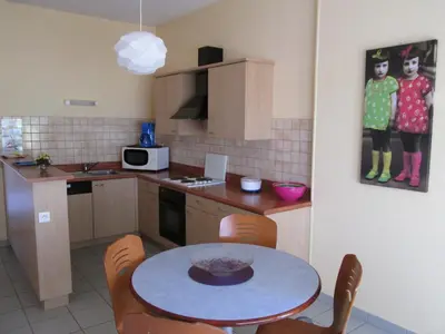 Cuisine ou kitchenette dans l'établissement Village de Gîtes de l'Anse de Moidrey