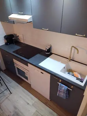 Cuisine ou kitchenette dans l'établissement Le triplex Côté plage plein Sud