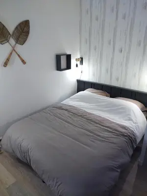Un ou plusieurs lits dans un hébergement de l'établissement Le triplex Côté plage plein Sud