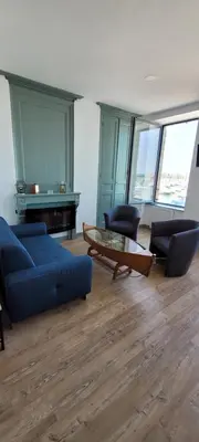 Coin salon dans l'établissement Gîte la rose des vents