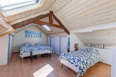 Un ou plusieurs lits dans un hébergement de l'établissement La Rochambelle - Charmante maison de pêcheurs