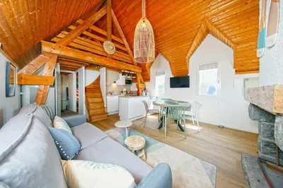 Coin salon dans l'établissement Marée Haute et Marée Basse - 1 Appartement et 1 Studio proche de la plage
