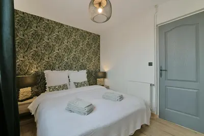 Un ou plusieurs lits dans un hébergement de l'établissement Le Cotentin - Joli appt 2 chambres à Carentan
