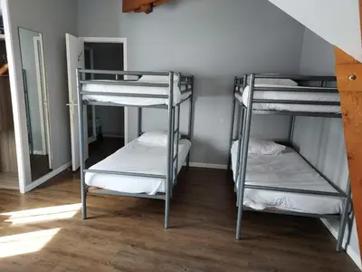 Un ou plusieurs lits dans un hébergement de l'établissement Hotel Eisenhower