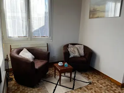 Coin salon dans l'établissement Maison les pieds dans l'eau