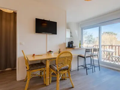 Télévision ou salle de divertissement dans l'établissement Apartment Eurydice by Interhome