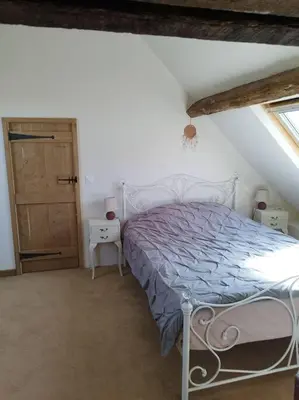 Un ou plusieurs lits dans un hébergement de l'établissement Chalet des Roches Roche d'Oëtre Suisse Normande