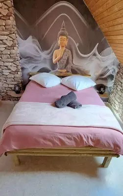Un ou plusieurs lits dans un hébergement de l'établissement Cottage La loge