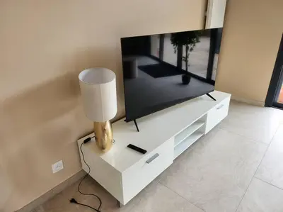 Télévision ou salle de divertissement dans l'établissement Chez Pascale