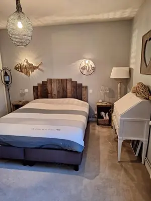 Un ou plusieurs lits dans un hébergement de l'établissement Woodland's House