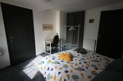 Un ou plusieurs lits dans un hébergement de l'établissement Maison avec terrasses à 300m de la mer Juno Beach