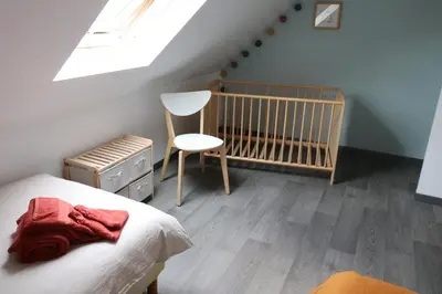 Un ou plusieurs lits dans un hébergement de l'établissement Maison avec terrasses à 300m de la mer Juno Beach