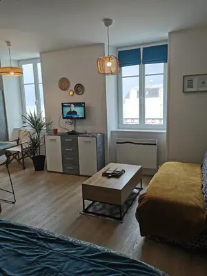Un ou plusieurs lits dans un hébergement de l'établissement Appartement 