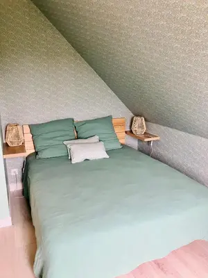 Un ou plusieurs lits dans un hébergement de l'établissement Maison familiale dans une rue paisible
