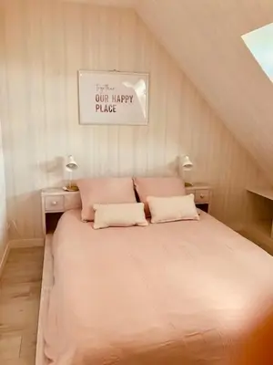 Un ou plusieurs lits dans un hébergement de l'établissement Maison familiale dans une rue paisible