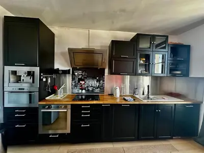 Cuisine ou kitchenette dans l'établissement La Vigie - 30 m de la mer, petite vue mer