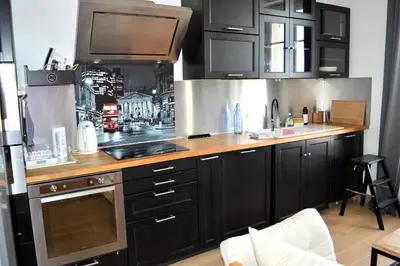 Cuisine ou kitchenette dans l'établissement La Vigie - 30 m de la mer, petite vue mer