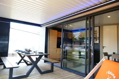 Balcon ou terrasse dans l'établissement Escales Voyages Cottage des Dunes - Chalet de 49m2 climatisé - 6 personnes