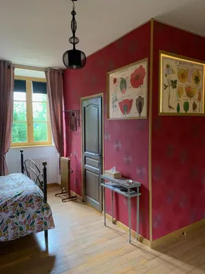 Un ou plusieurs lits dans un hébergement de l'établissement Le Petit Manoir