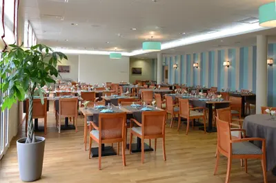 Restaurant ou autre lieu de restauration dans l'établissement Domitys La Plage de Nacre