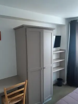 Télévision ou salle de divertissement dans l'établissement Hôtel de La Croix de Malte