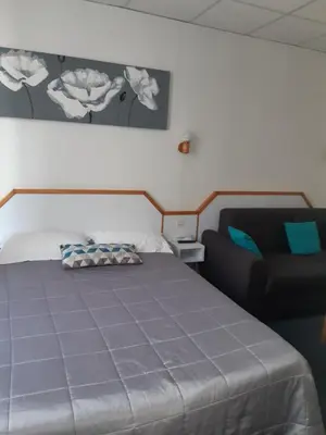 Un ou plusieurs lits dans un hébergement de l'établissement Hôtel de La Croix de Malte
