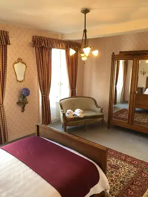 Un ou plusieurs lits dans un hébergement de l'établissement BnB@23
