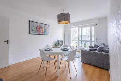 Coin salon dans l'établissement L'Ancre Marine - Appt à 100m de la plage