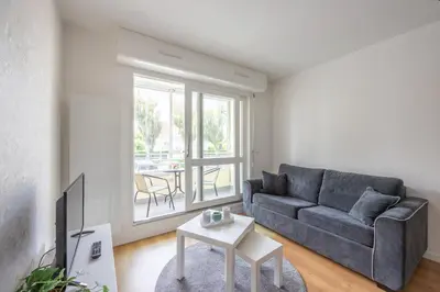 Coin salon dans l'établissement L'Ancre Marine - Appt à 100m de la plage